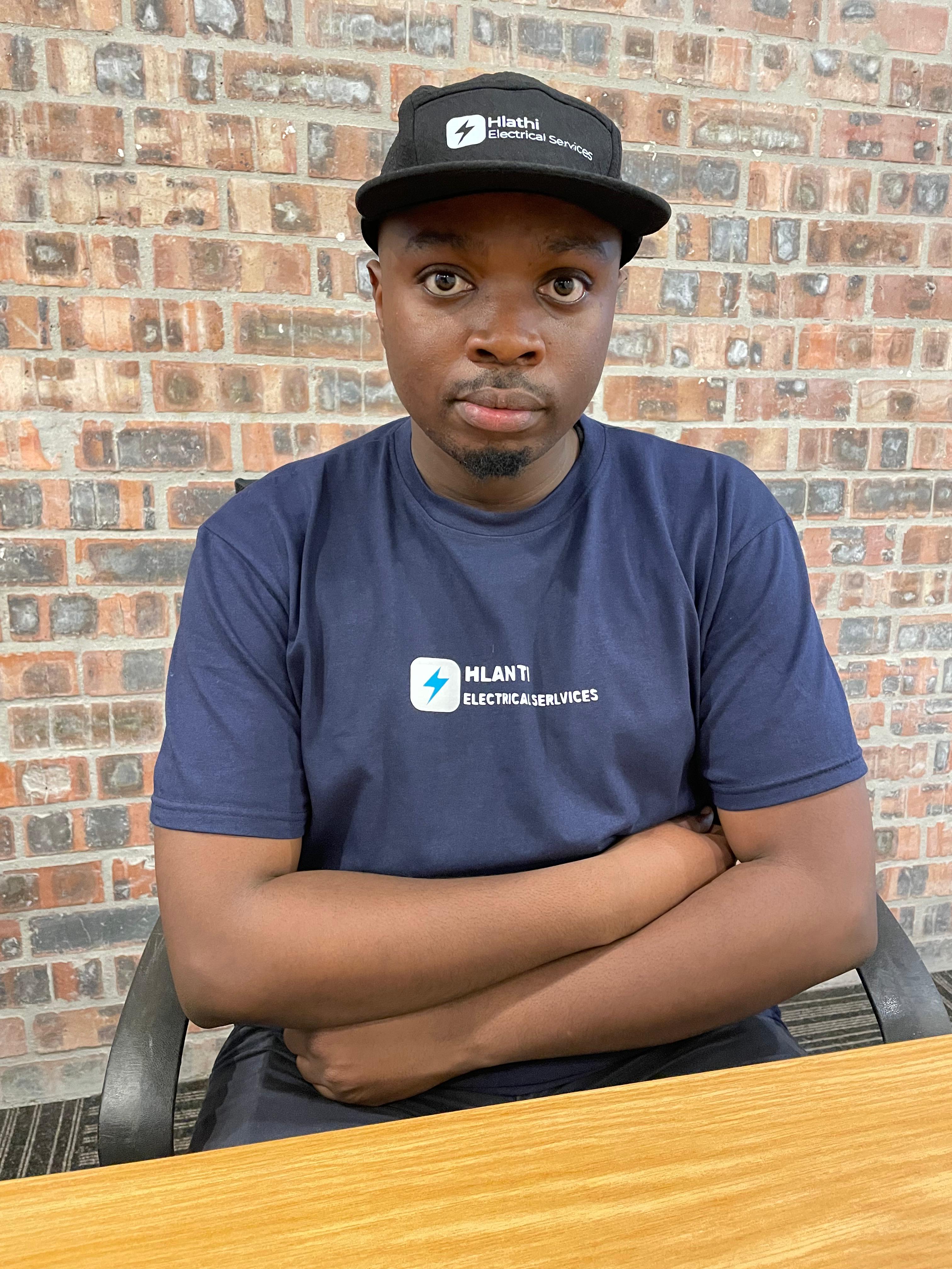Professional electrician from Hlathi Electrical Services ready to help with electrical repairs